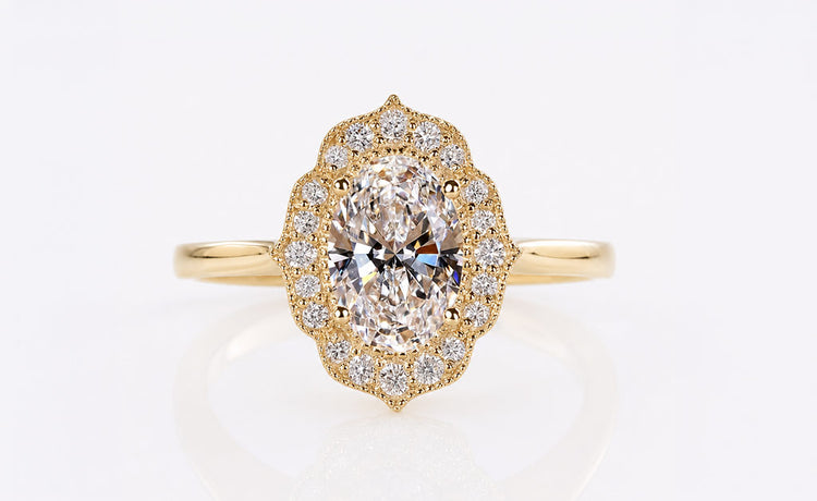 Vintage style engagement rings with milgrain and ornate gold detailing