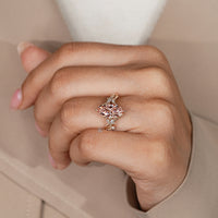 Marquise cut diamond ring with leaf prong setting.