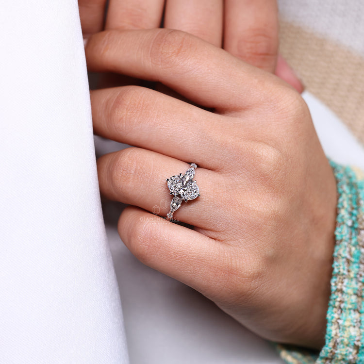 Lab grown oval cut diamond ring with tapered shank.
