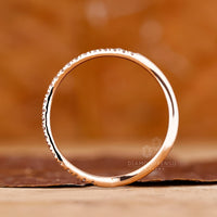 Lab grown round diamond band ocean wave style.
