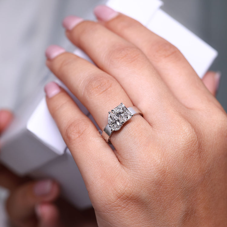 Lab grown radiant and pear cut diamond ring design.
