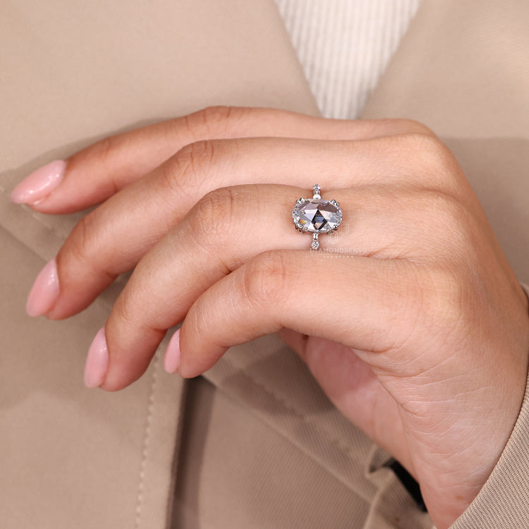 Elegant oval rose cut diamond ring with hidden accent.
