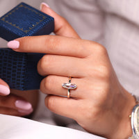 Moval rose cut ring double claw prong solitaire style.
