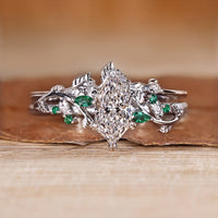 Dutch marquise diamond bridal set with green emeralds.