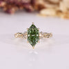 Handmade Dutch marquise diamond ring with green centre diamond.