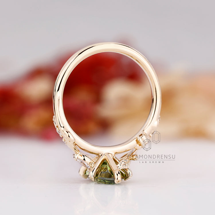 Marquise diamond ring nature inspired green cluster.