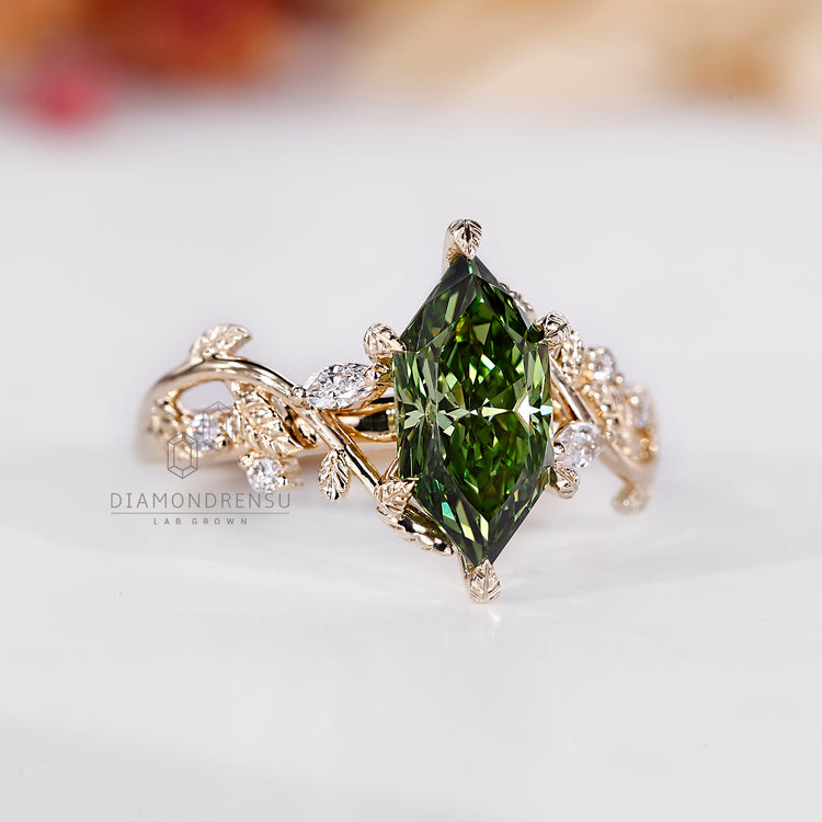 Marquise diamond ring green cluster art deco design.