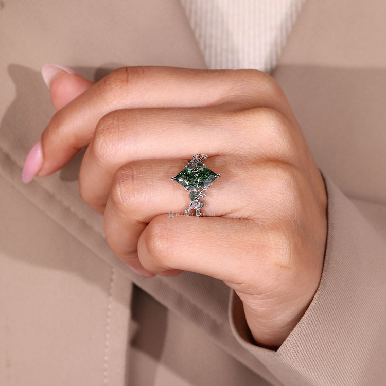 Handmade marquise diamond ring with inspired leaf prongs.