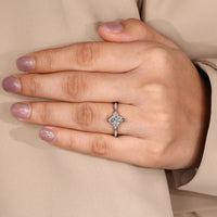 Dutch marquise ring milgrain v prong cluster setting.
