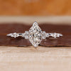 Dutch marquise diamond ring vintage cluster milgrain.
