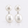 White semi-baroque freshwater pearl hanging from button pearl stud earrings