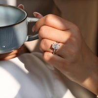Cushion cut ring hidden halo distance pave setting.
