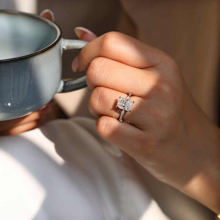 Cushion cut ring hidden halo distance pave setting.
