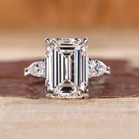 Emerald Cut Diamond Ring with pear side stones.
