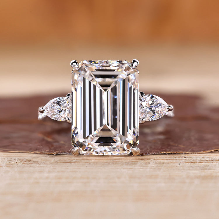 Emerald Cut Diamond Ring with pear side stones.
