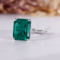 Handmade emerald cut ring marquise round pave design.
