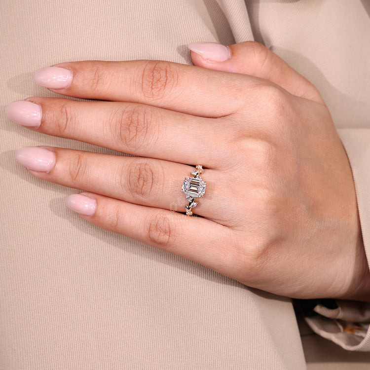 Elegant nature inspired emerald old European cut ring.
