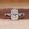 Cushion cut diamond ring hidden halo distance pave.
