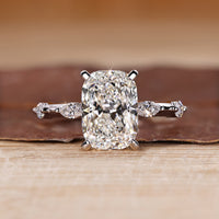 Cushion cut diamond ring hidden halo distance pave.
