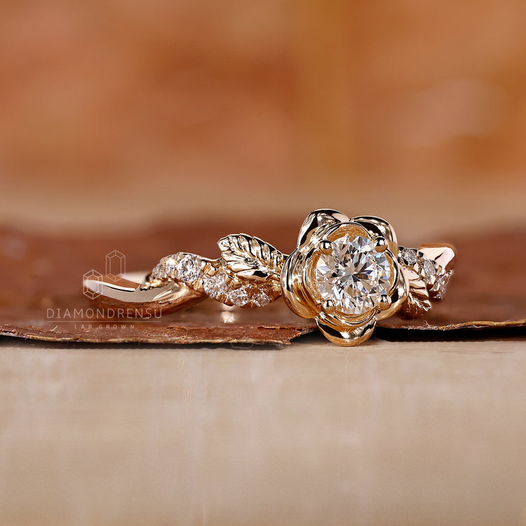 Flower style round diamond ring twisted shank.