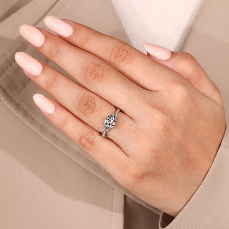 Round diamond ring cathedral setting pave band.