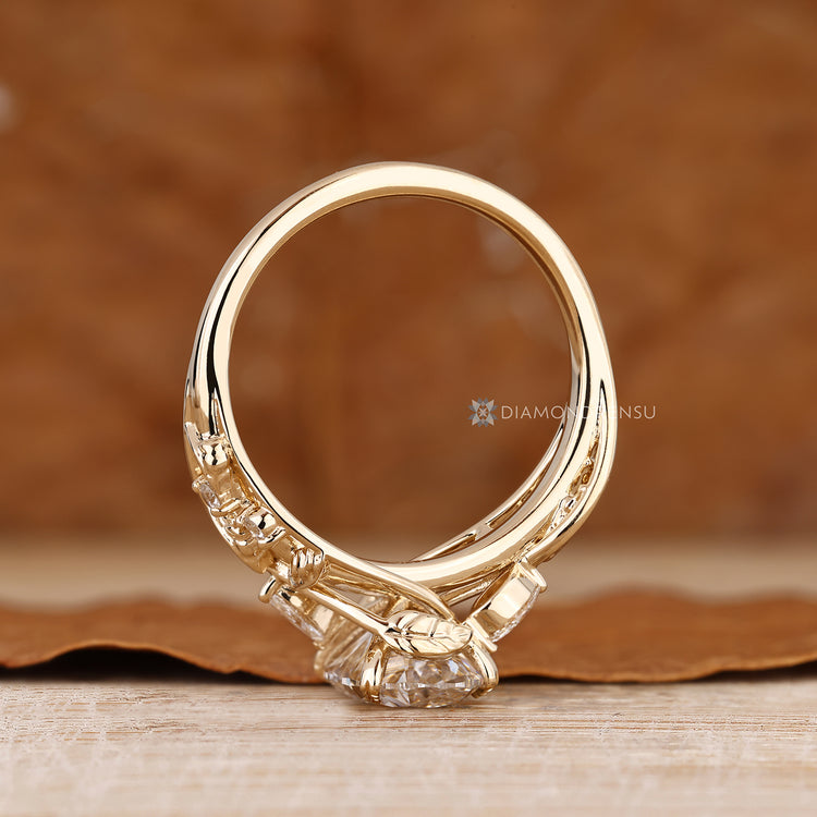 IGI certified oval diamond ring four leaf prongs.