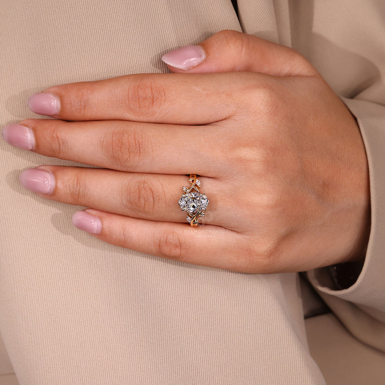 Oval cut diamond ring twisted shank leaf prong set.
