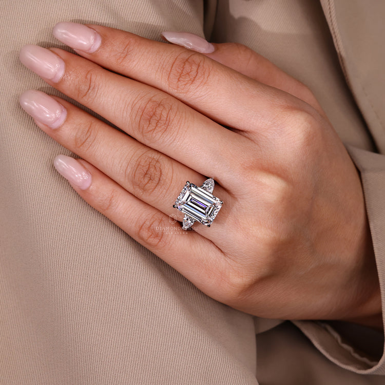 Lab Grown Emerald Cut Diamond Ring with pear stones.
