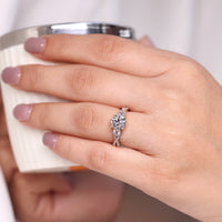 Three stone round diamond ring vintage twisted shank.