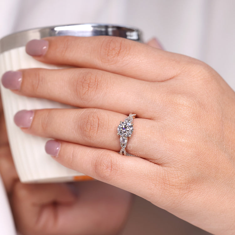 Three stone round diamond ring vintage twisted shank.