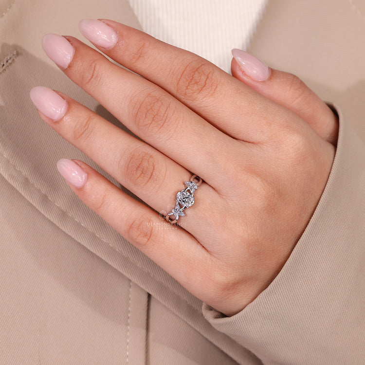 Lab grown oval diamond ring with twisted shank design.
