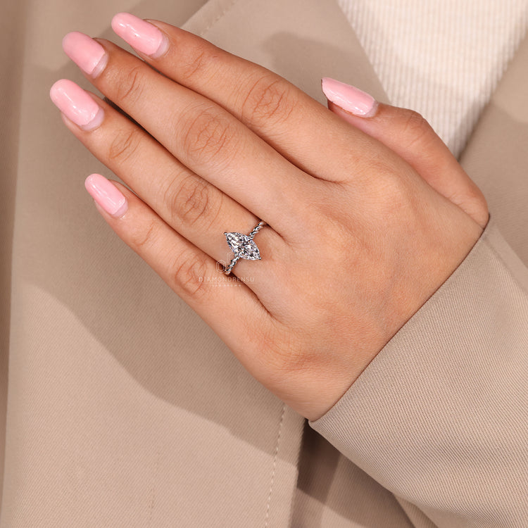 Marquise diamond ring IGI certified solitaire style.

