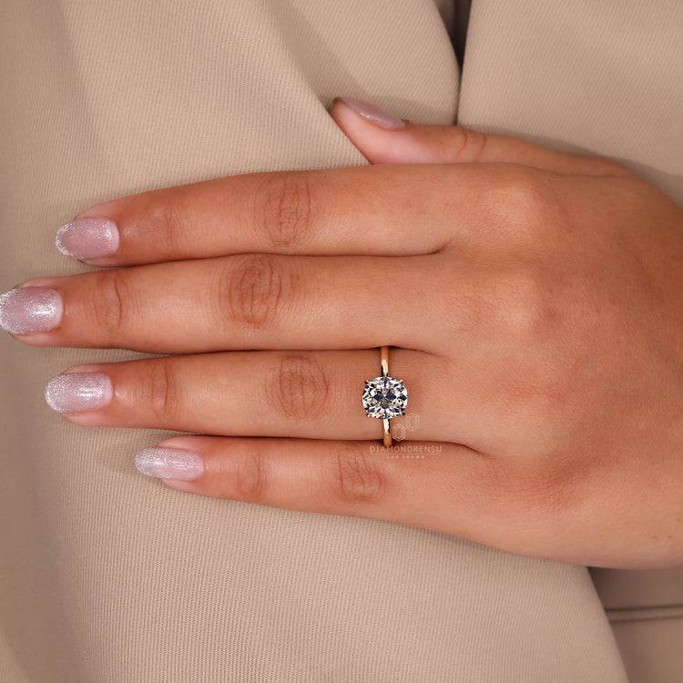 Handmade cushion old European cut ring solitaire style.