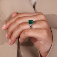 Asscher cut ring cathedral four claw prong design.
