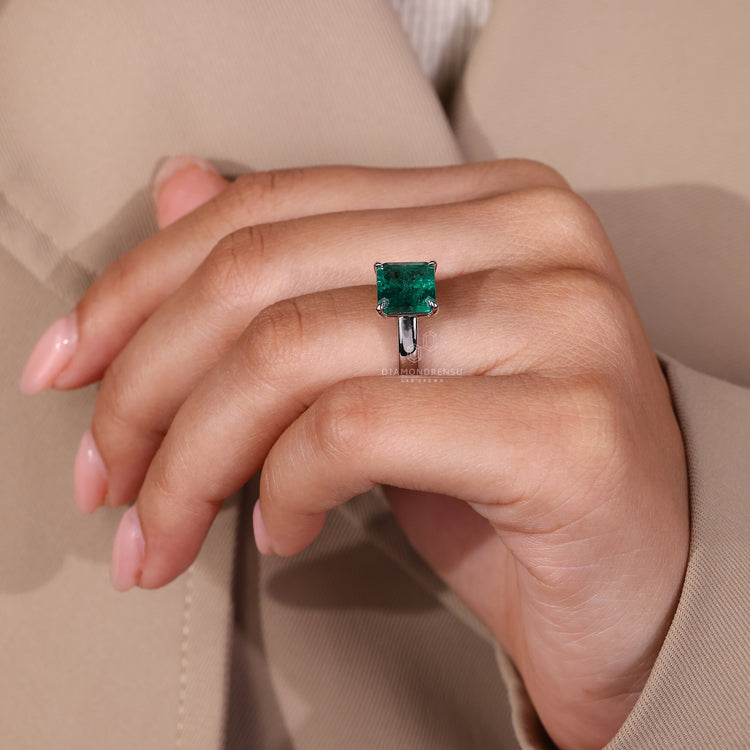 Asscher cut ring cathedral four claw prong design.
