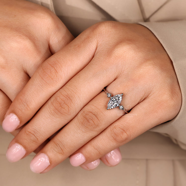 Marquise diamond ring IGI certified knife edge.
