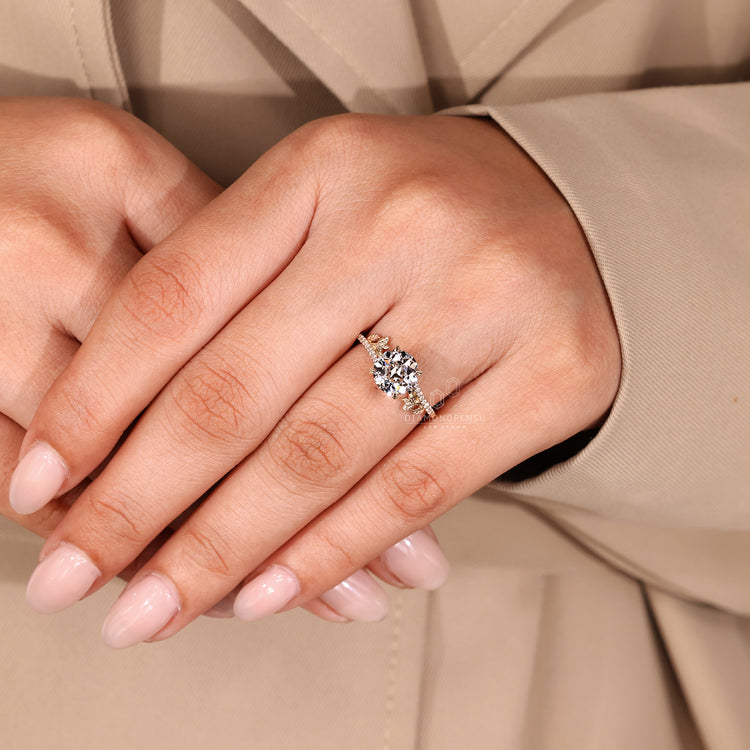 Round old cut ring four claw prong cathedral set.
