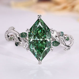 Handmade Dutch marquise diamond ring with green centre stone.