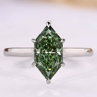 Dutch marquise green diamond ring solitaire style.