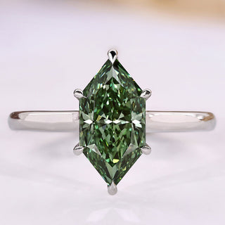 Dutch marquise green diamond ring solitaire style.