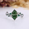 Dutch marquise diamond ring with green diamond.