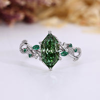 Dutch marquise diamond ring with green diamond.