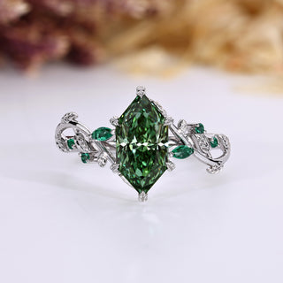 Dutch marquise diamond ring with green diamond.