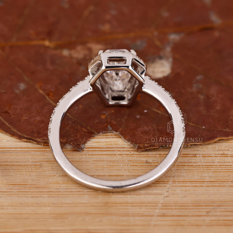 IGI certified coffin diamond ring four prong set.
