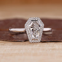Halo coffin diamond ring open gallery style.