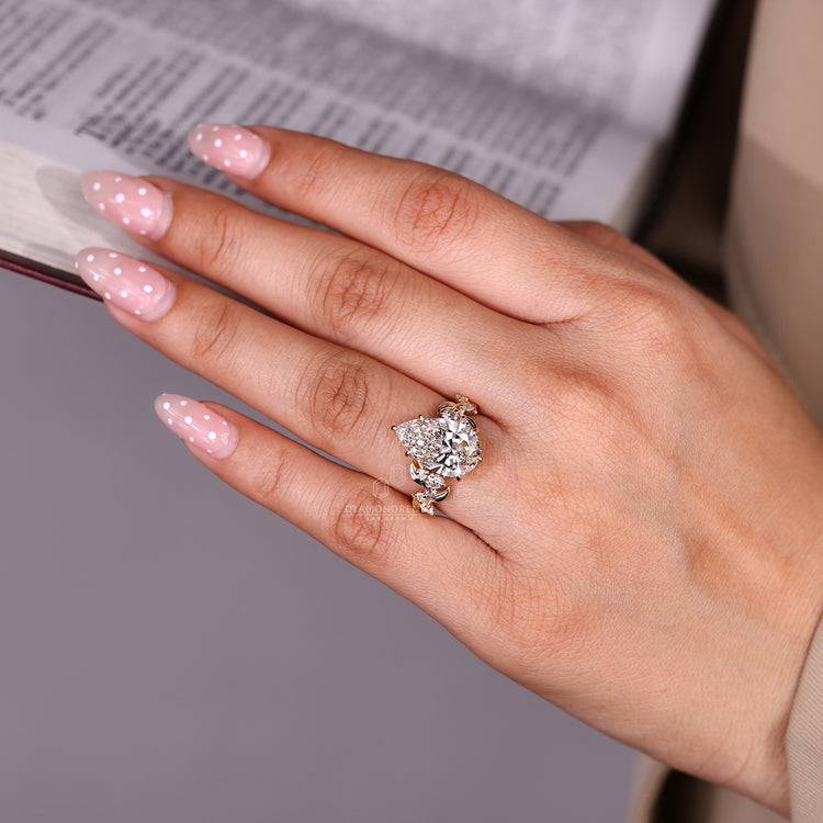 Pear Cut Diamond Engagement Ring cluster setting.
