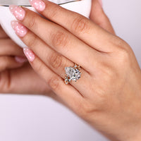 Pear Cut Diamond Ring leaf style prong setting.
