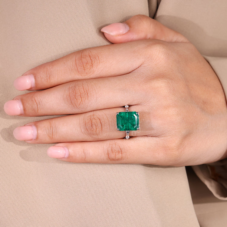 Emerald cut emerald ring handmade pave setting style.
