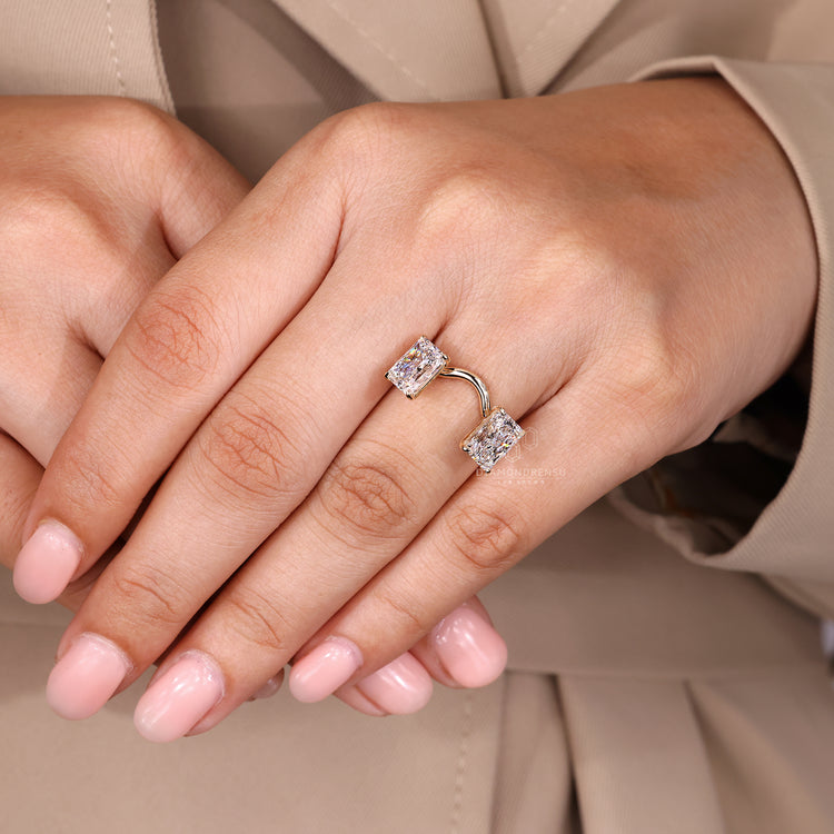 Radiant cut lab diamond curved ring with claw setting.

