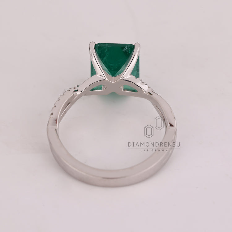 Handmade emerald cut ring with fine detailing.
